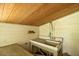 Poolside outdoor sink and faucet with overhead wood plank ceiling at 307 Fairington Dr, Summerville, SC 29485