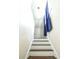 Bright staircase featuring neutral walls, carpeted treads, and a transom window at 307 Fairington Dr, Summerville, SC 29485