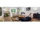 Inviting living room featuring stylish furniture, a large window, and modern decor at 319 Tiliwa Street, Summerville, SC 29486