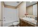 This bathroom features a shower-tub combo and a stylish single-sink vanity with marble-style countertop at 320 Bedford Rd, Cross, SC 29436
