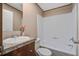 This bathroom features a shower-tub combo and a stylish single-sink vanity with marble-style countertop at 320 Bedford Rd, Cross, SC 29436