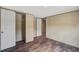 This empty bedroom features wood-look floors, a closet, and neutral-colored walls creating a clean, modern space at 320 Bedford Rd, Cross, SC 29436