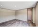 This bright, empty bedroom features wood-look floors and neutral-colored walls creating a modern space at 320 Bedford Rd, Cross, SC 29436