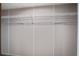 Walk-in closet featuring wall-mounted, white wire shelving for optimal storage and organization at 320 Bedford Rd, Cross, SC 29436