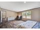 Spacious main bedroom featuring lots of natural light, wood-look floors, and neutral colored walls at 320 Bedford Rd, Cross, SC 29436