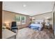 Spacious main bedroom featuring lots of natural light, wood-look floors, and neutral colored walls at 320 Bedford Rd, Cross, SC 29436