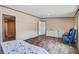 Spacious main bedroom featuring wood-look floors, neutral colored walls, and ensuite bathroom at 320 Bedford Rd, Cross, SC 29436