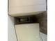 The carpeted stairwell has neutral colored walls at 320 Bedford Rd, Cross, SC 29436