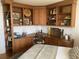 Cozy bedroom with custom wood built-ins, comfortable bed, and unique decor, offering a warm and inviting personal space at 330 Concord St # 4B, Charleston, SC 29401