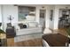 Cozy living room featuring modern decor, a comfortable sofa, and elegant accents at 330 Concord St # 4B, Charleston, SC 29401