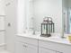 Bright bathroom features dual sinks with modern fixtures and a large vanity at 337 Pine Crest View Dr, Summerville, SC 29486