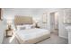 Well-lit bedroom features neutral decor, carpeted floors, and an ensuite bathroom at 337 Pine Crest View Dr, Summerville, SC 29486