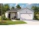 Charming single-story home with a two-car garage and well-manicured front yard at 337 Pine Crest View Dr, Summerville, SC 29486