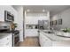 Beautiful kitchen with white cabinetry, a stainless steel fridge, and granite countertops at 337 Pine Crest View Dr, Summerville, SC 29486