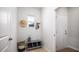 Mud room features shelving, a coat rack, a window, and easy access to the front door at 337 Pine Crest View Dr, Summerville, SC 29486