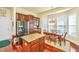Well-appointed kitchen featuring stainless steel refrigerator and center island with granite countertops at 3502 Stockton Dr, Mount Pleasant, SC 29466