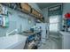 Functional laundry room with a utility sink, a stainless steel table, and lots of storage space at 3502 Stockton Dr, Mount Pleasant, SC 29466