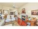 Inviting living room with fireplace, wood floors, and lots of natural light at 3502 Stockton Dr, Mount Pleasant, SC 29466