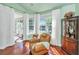 Bright sitting room or nook features views of the water, windows, and a comfortable chair at 3502 Stockton Dr, Mount Pleasant, SC 29466