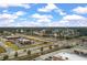 Expansive aerial view of a commercial area featuring multiple businesses and roadways at 364 Deep River Rd, Summerville, SC 29486