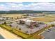 Aerial view of a McDonald's restaurant with drive-thru, parking, and surrounding landscape at 364 Deep River Rd, Summerville, SC 29486