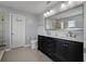 Elegant bathroom with dual sinks, marble countertops, and decorative hardware at 364 Deep River Rd, Summerville, SC 29486