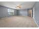 Spacious bonus room with carpet flooring, a ceiling fan, a window, and plenty of room at 364 Deep River Rd, Summerville, SC 29486
