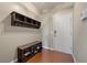 Functional foyer with shoe storage bench and wall-mounted coat rack at 364 Deep River Rd, Summerville, SC 29486