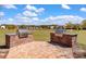 Outdoor grilling area with built-in brick grills and brick patio, perfect for community cookouts and gatherings at 364 Deep River Rd, Summerville, SC 29486