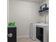Well-organized laundry room with modern washer, dryer, and plenty of storage space at 364 Deep River Rd, Summerville, SC 29486