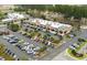 Overhead view of a busy parking lot in front of commercial building with retail businesses at 364 Deep River Rd, Summerville, SC 29486