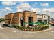 Exterior shot of a Starbucks building featuring a drive-thru and inviting outdoor seating at 364 Deep River Rd, Summerville, SC 29486