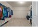 Spacious walk-in closet with ample storage and carpeted floors at 364 Deep River Rd, Summerville, SC 29486