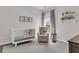 This Bedroom features neutral colors, bunny decor, and a comfortable rocker for a new baby at 3968 Hanoverian Dr, Mount Pleasant, SC 29429