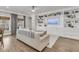 Cozy living room showcases a built-in bookshelf, a ceiling fan, and a comfortable sofa at 3968 Hanoverian Dr, Mount Pleasant, SC 29429