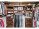 Spacious walk-in closet with custom built-in shelving and drawers for optimal storage at 3968 Hanoverian Dr, Mount Pleasant, SC 29429
