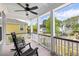Relaxing porch with comfortable rocking chairs overlooking the neighborhood at 408 Branch Creek Trl, Summerville, SC 29483