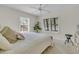 Bright bedroom with two windows and neutral decor that provides a calming atmosphere at 410 Ocean Oaks Ct, Kiawah Island, SC 29455