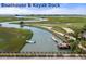 Waterfront view of the community boat house and kayak dock with kayak rentals at 410 Ocean Oaks Ct, Kiawah Island, SC 29455