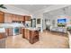 Kitchen with stainless steel appliances, granite counters, tile flooring and view to other living spaces at 410 Ocean Oaks Ct, Kiawah Island, SC 29455