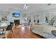 Expansive primary bedroom features a fireplace, sitting area, and access to private balconies at 410 Ocean Oaks Ct, Kiawah Island, SC 29455