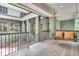 Charming porch with porch swing and view of the courtyard, perfect for relaxation and enjoyment at 410 Ocean Oaks Ct, Kiawah Island, SC 29455