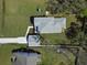 An overhead view shows this beautiful home with detached garage and a sprawling yard and drive at 4209 Royal Harbor Rd, Hollywood, SC 29449