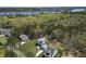 Aerial view of home showcasing mature trees, backyard, and proximity to marsh at 4209 Royal Harbor Rd, Hollywood, SC 29449
