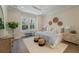 Comfortable bedroom with a large window, neutral decor, and stylish furnishings at 4209 Royal Harbor Rd, Hollywood, SC 29449