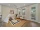 Inviting bonus room features stylish rug, teepee, and cozy seating area with exterior access at 4209 Royal Harbor Rd, Hollywood, SC 29449