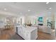 A full kitchen opens up to a living room with a fireplace at 4209 Royal Harbor Rd, Hollywood, SC 29449