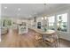 Bright, open kitchen with stainless steel appliances, modern finishes, and a breakfast nook at 4209 Royal Harbor Rd, Hollywood, SC 29449