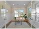 Bright home office with wainscoting, large windows, and modern decor at 4209 Royal Harbor Rd, Hollywood, SC 29449