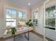 Well-lit office showcases modern desk, inviting decor, and large windows at 4209 Royal Harbor Rd, Hollywood, SC 29449